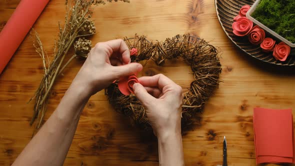 Female Hands Makes Valentines Day DIY Decoration