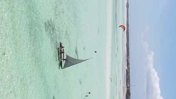 Vertical Video Boats in the Ocean Near the Coast of Zanzibar Tanzania Aerial View