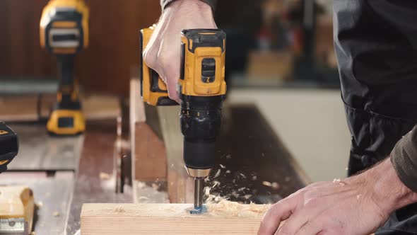 Young Carpenter Working in His Workshop