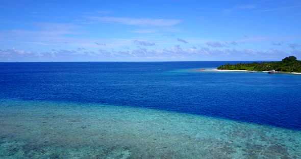 Luxury overhead abstract view of a white sand paradise beach and blue water background 