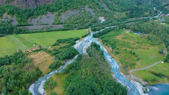 River forming a delta before flowing into a lake