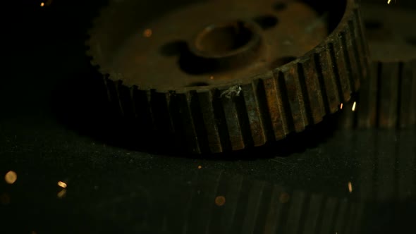 Sparks with gears in ultra slow motion 