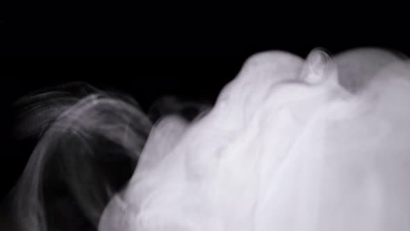 Thick Steam Cloud Vaporing Into Air From Humidifier