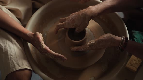 Potter Teach Teenager Working with Pottery Wheel