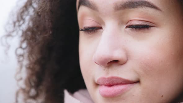 Closeup Female Human Face with Clean Dark Skin Cosmetology Dermatology Concept