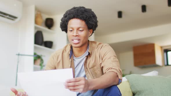 Talking african american man making video call