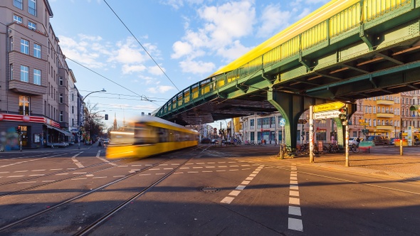 Day Time Lapse of Eberswalder Strasse with subway trams and cars Berlin, Germany