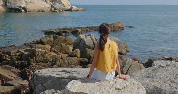 Woman enjoy the view of the sea