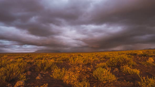 Timelapse of Landscape in the Atacama desert going from Sunset into night with lots of clouds.
