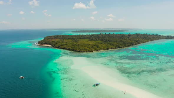 Sandy Beach in the Lagoon with Turquoise Water