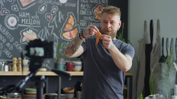 Chef Talking about Shrimps on Camera while Filming Food Vlog