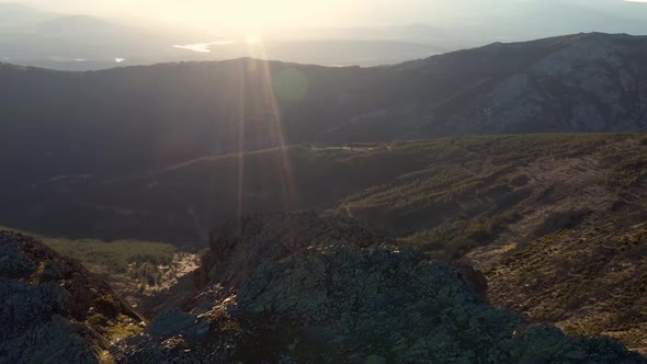 Hiker looking over Puebla de la Sierra mountains, Spain