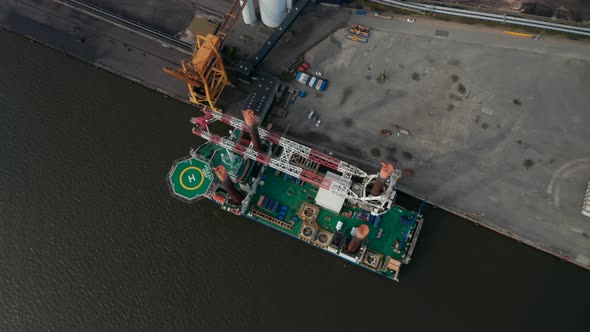 Aerial View of Liebherr Seafox 5 Offshore Crane Moored in Front of Esbjerg's Power Station in