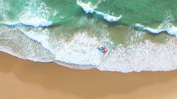 PRAIA DA GUINCHO BEACH, PORTUGAL - MAY 23, 2017: People kitesurfing at popular blue flag Guincho bea