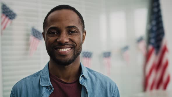 Portrait video of black man in ballot place. Shot with RED helium camera in 8K.