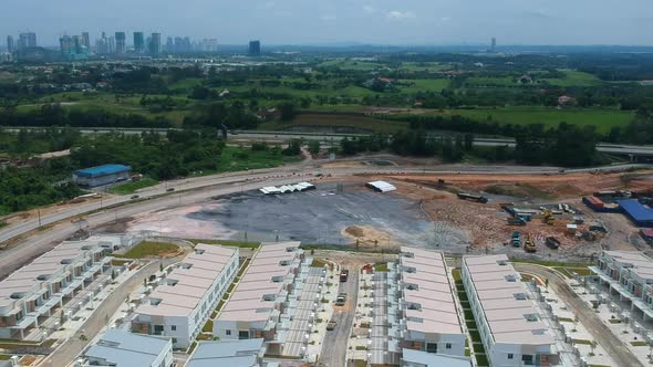 wide shots of house in constructions and road widening