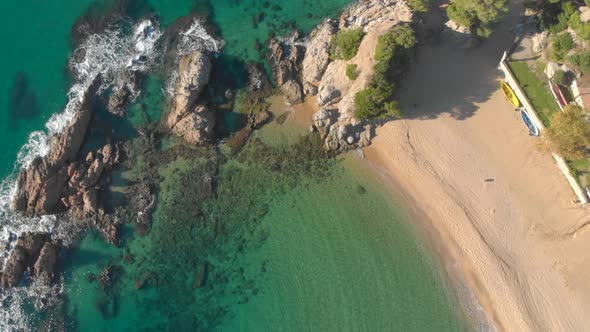 Aerial shots, beach, europe, turquoise water rock, sand, vegetation, transparent water