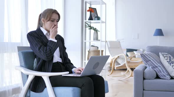 Wondering Woman in Shock While Working on Laptop