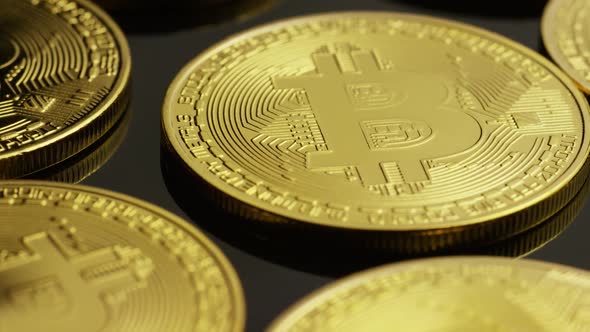 Rotating shot of Bitcoins (digital cryptocurrency) -BITCOIN