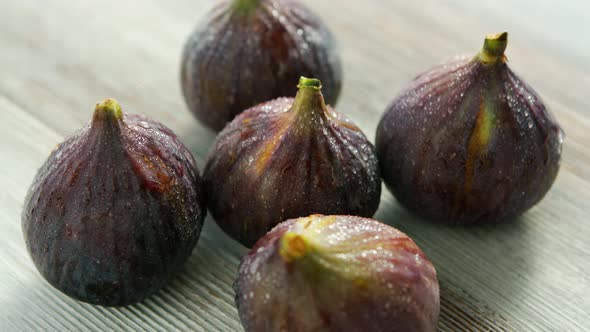 Wet Washed Whole Figs on Table