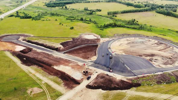 Aerial View of the Yellow Road Rollers That Lay the Asphalt of the Test Ground for Cars