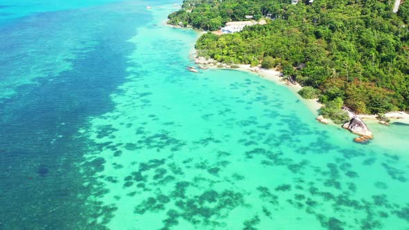 Aerial drone view travel of idyllic resort beach adventure by clear water and white sand background 