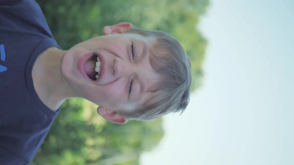 Boy Emotionally Chews an Apple