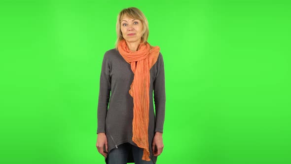 Middle Aged Blonde Woman with Shocked Wow Face Expression. Green Screen