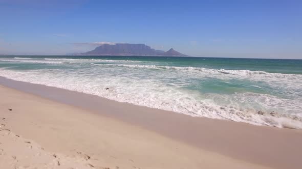Aerial travel drone view of Table Mountain, Table Bay from Bloubergstrand, Cape Town, South Africa.