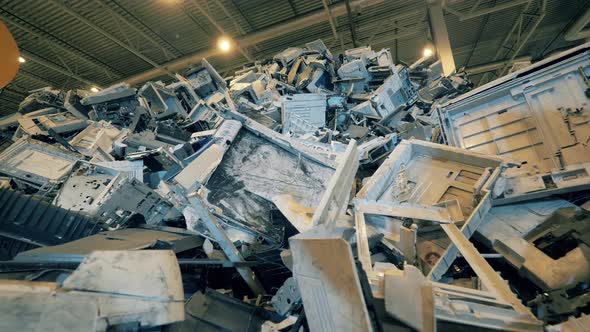 A Pile of Discarded Plastic Equipment in a Dumpsite Unit