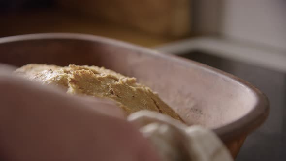 BAKING - Freshly baked sourdough bread, slow motion close up