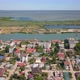 Aerial View Of Sulina City Harbor And The Danube Flowing Into The Black Sea - VideoHive Item for Sale