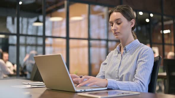 Young Woman Typing on Laptop, Online Work