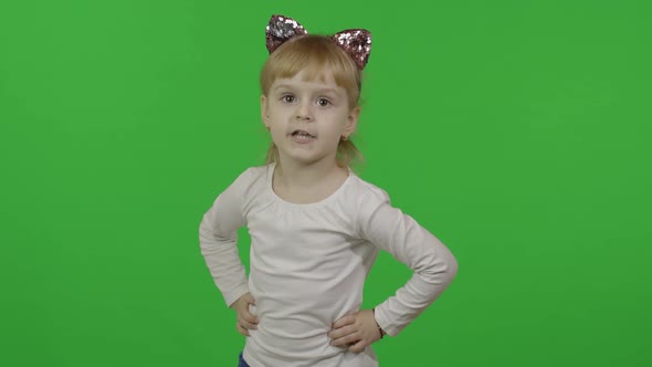 Girl in Headband with a Cat Ears Dancing. Happy Four Years Old Child. Chroma