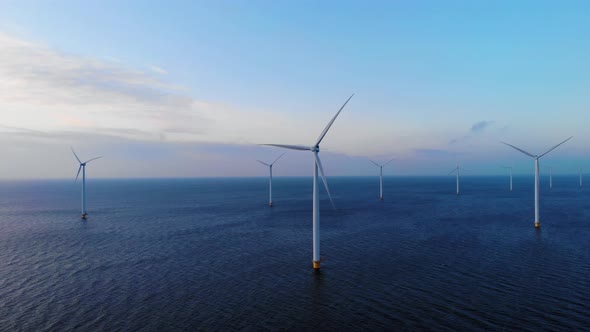 Windmill Park in the Ocean Drone Aerial View of Windmill Turbines Generating Green Energy Electric