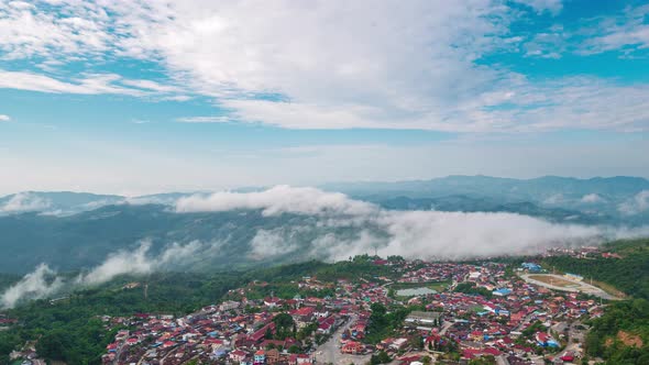 Time lapse: sunrise at Phongsali, North Laos near China. Yunnan style town on scenic mountain ridge