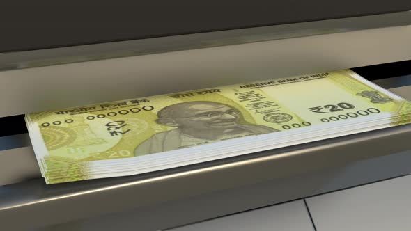 20 Indian rupees  in cash dispenser. Withdrawal of cash from an ATM.
