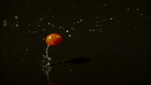 Cherry tomato falling, Ultra Slow Motion