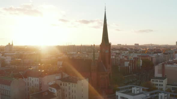 Red Church in Berlin, Germany Neighbourhood, Scenic Wide Angle Aerial Shot in Beautiful Golden Hour