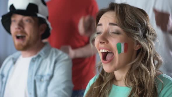 Italian Supporters Watching Game on Tv, Shouting and Supporting National Team