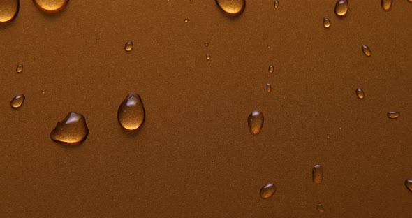 Abstract water drops on gold bronze background, macro, Bubbles close up