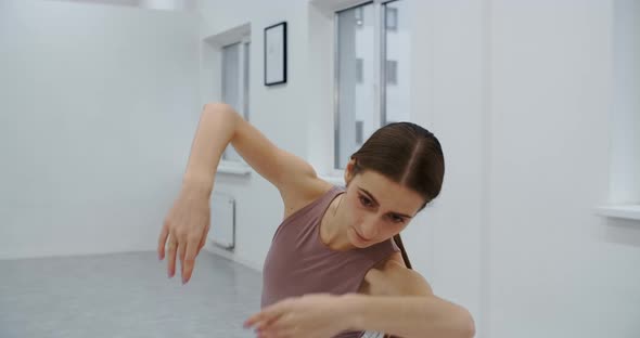 Ballerina Is at the Ballet School Rehearsal Choreographer Rehearses in the White Dance Hall Graceful