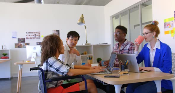 Multi-ethnic business people interacting with each other in modern office 4k