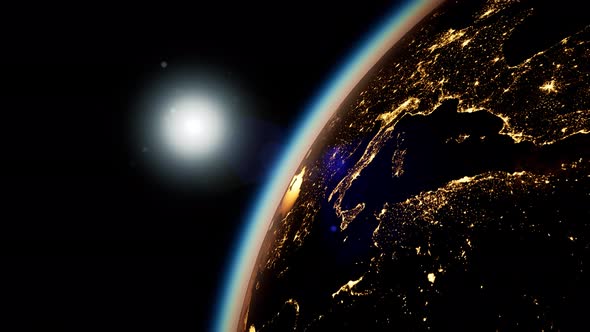 Space, Sun and Planet Earth at Night alt