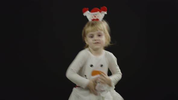 Happy Beautiful Baby Girl in Snowman Costume