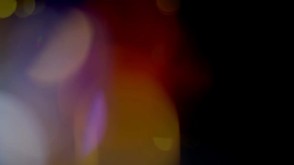 Multicolored Light Leaks  Footage on Black Background Stylizing Video Transitions Bokeh Effect