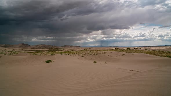 Dangerous thunderstorm moving over the landscape at Little Sahara desert
