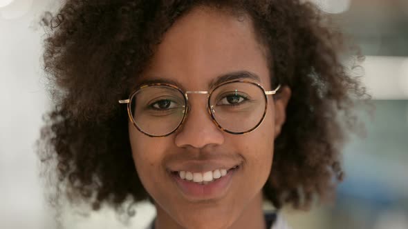 Close Up of Young African Businesswoman Smiling at the Camera 