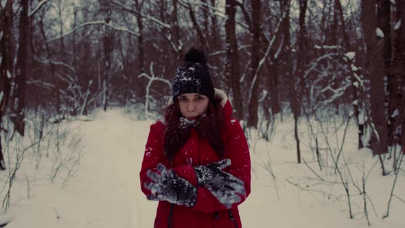 Young Frozen Woman in in the Header and Red Jacket