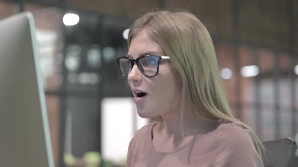 Portrait Shoot of Successful Woman Working on Desktop